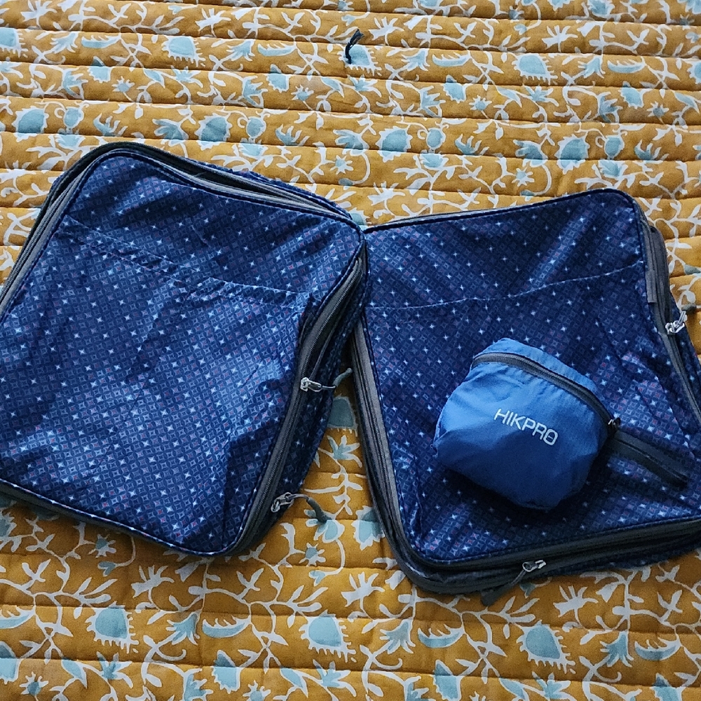 **Travel gear!!!**. Two XL Packing Cubes and lightweight nylon daypack!